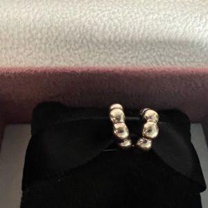 Pandora 14kt spacers. Very difficult to find and are beautiful!